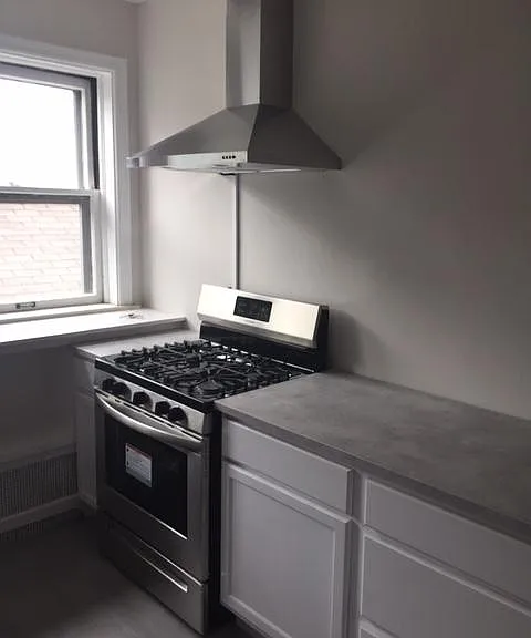 Gas stove with matching stainless steel hood