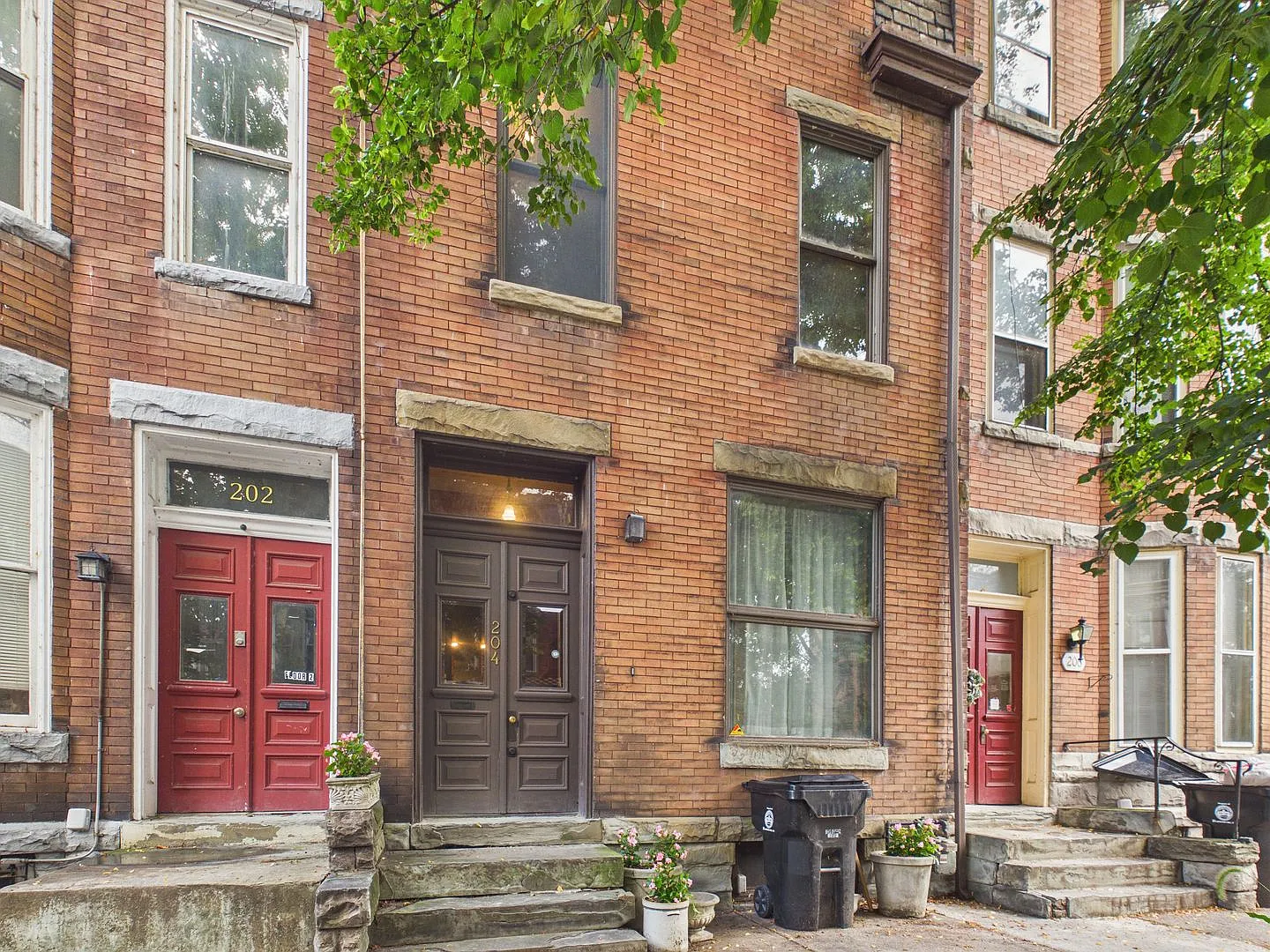 Charming 2 Bedroom Loft-Style Row Home — Photo 1