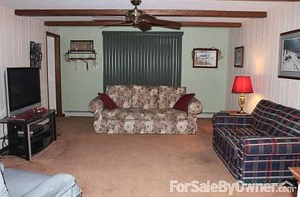 Great Room/Living Room : 19' x 14' w/French Door access to mountain view off 38' x 12' Deck.