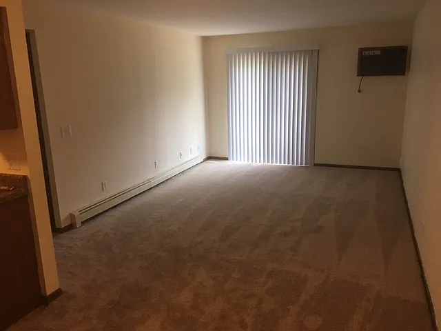 Living room, leading out to balcony