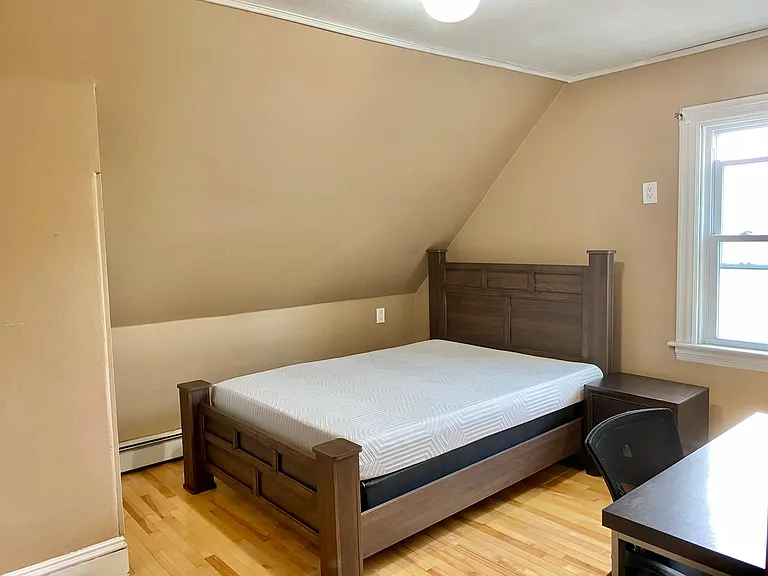 Furnished Bedroom 3 (w half bath and private rear entrance)