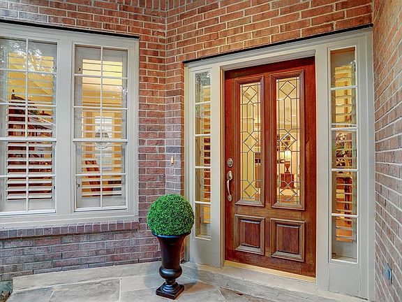 A lovely, gated courtyard to welcome family and friends.