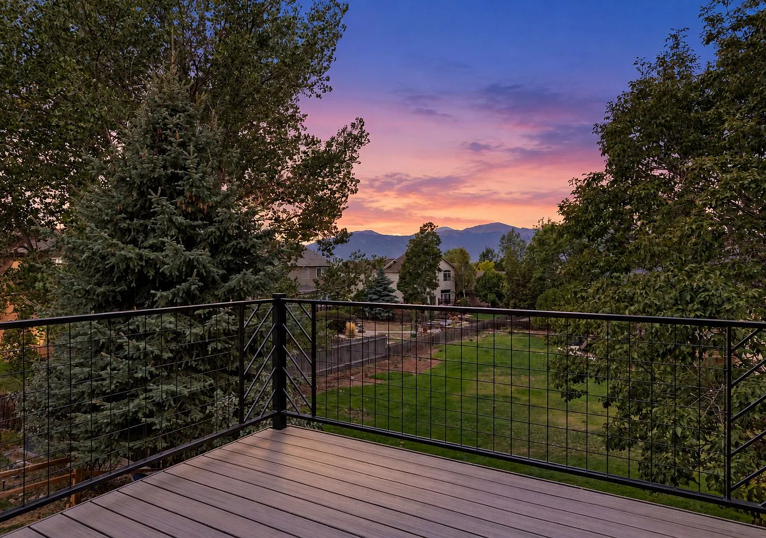 Stunning 5-Bedroom Walk-Out Ranch Style Home with Magnificent Pikes Peak Views — Photo 4