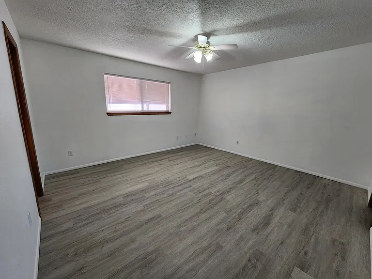 Primary bedroom on front main level of home.