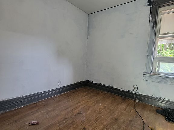 bedroom1 facing south ,wood floor,new paint