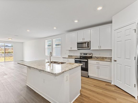 Kitchen in the Daphne Floorplan at 2514 Moose Trail in Deer Run at Crosswinds