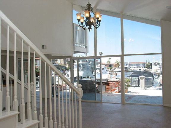 Gorgeous living area looks out on waterfront