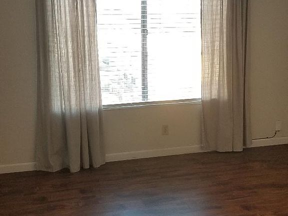 Looking into living room toward front window