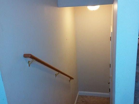 Stairs in apartment up from entry - photo from mirror image 