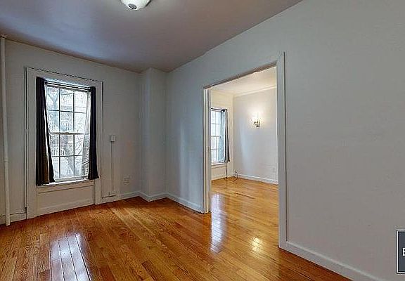 5th image of 336 E 56th St APT 4