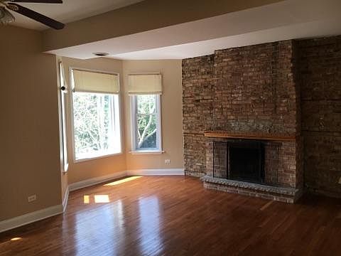 fireplace with exposed brick