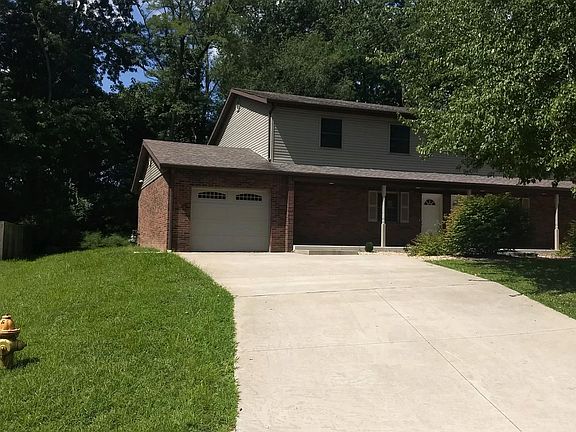 CHECKOUT THE LARGE DRIVEWAY THAT LEADS TO THE ONE CAR GARAGE. BRING YOUR CHAIR AND SIT ON THE OPEN FRONT PORCH.