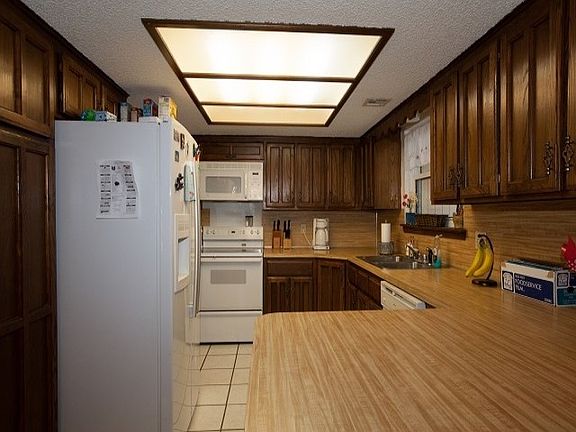 Dining Room has Lovely Chandelier