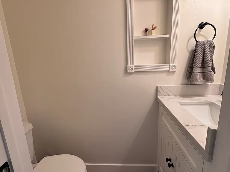 Downstairs half bath with updated finishes