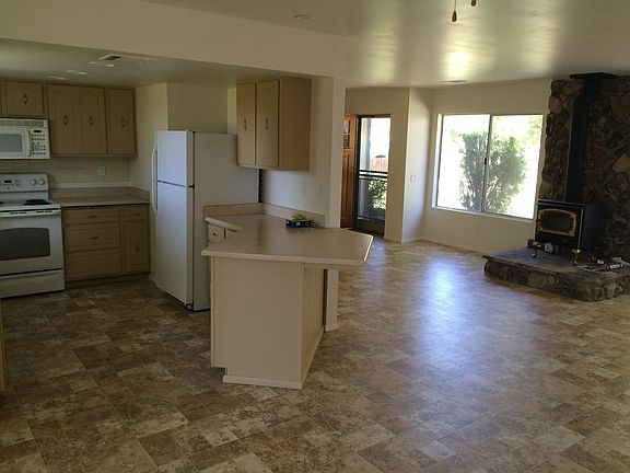 Newly painted, new flooring, new wood stove. Beautiful open