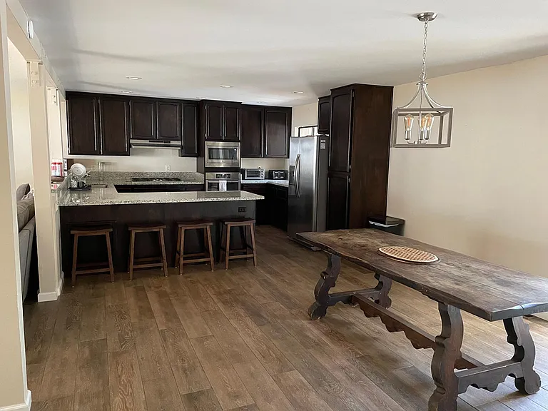 Table includes chairs (not pictured)