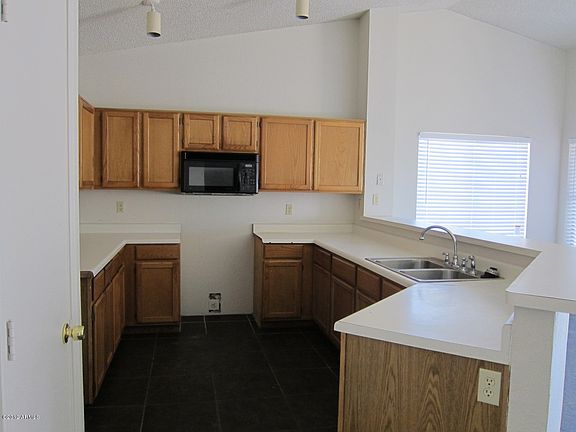 5th image of 8731 W Wilshire Dr