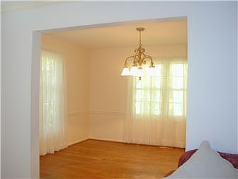 Dining room with chandelier incuded