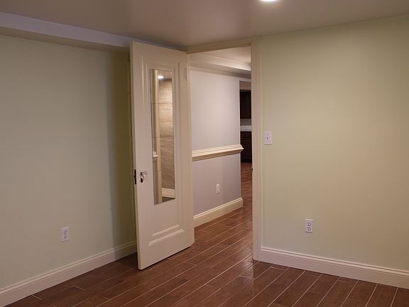 Entrance to bedroom that leads to hall.