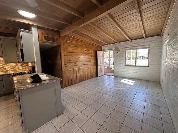 Warm Wood Walls and Valuted, Beamed Ceilings