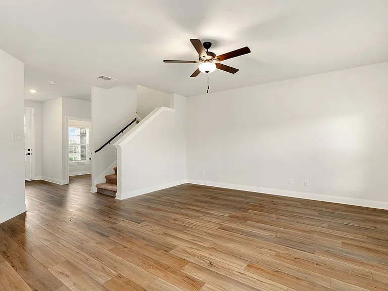 Vinyl flooring found throughout the first floor.