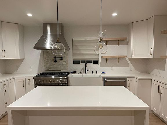 Contemporary kitchen with Thermador stainless steel appliances