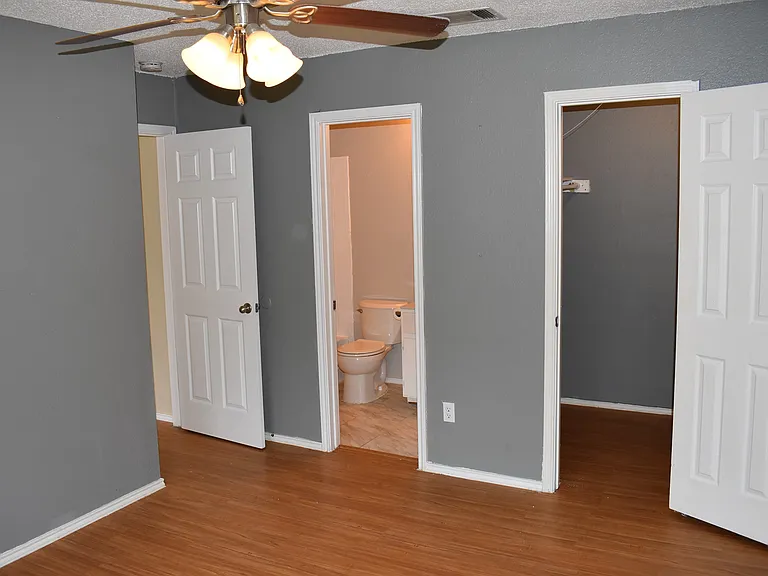 Primary bedroom includes a primary bathroom and a walk-in closet