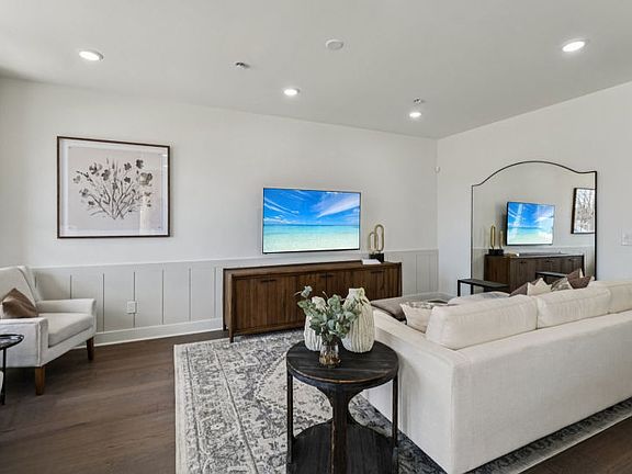 Gathering room opens to kitchen