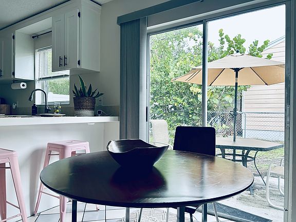 Dining Area and Private Patio Access