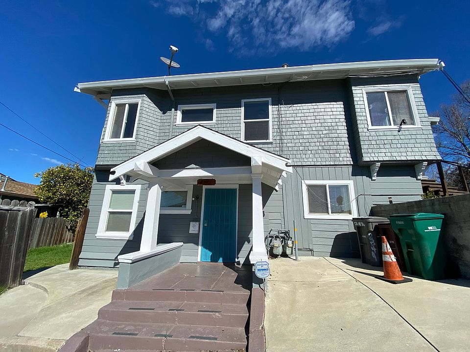 Entry. Small parking space to right of entry