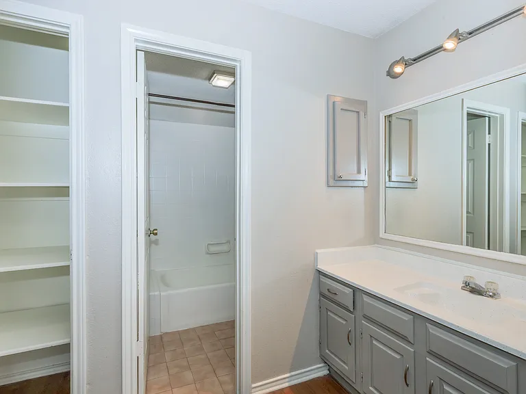 1 bedroom vanity area, plenty of storage huge walk in closet, private restroom