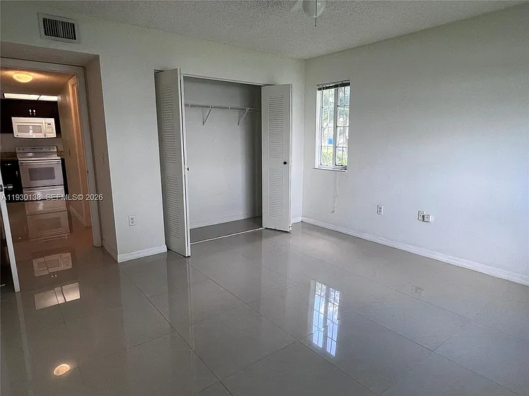 5061 Wiles Rd #102 — Photo 10