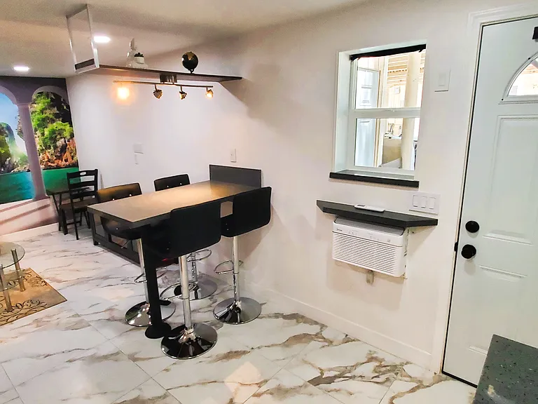Bar table with bar stools