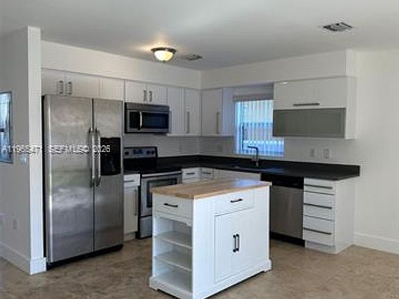 5th image of 2772 SW 31st Ct #Townhouse 2772