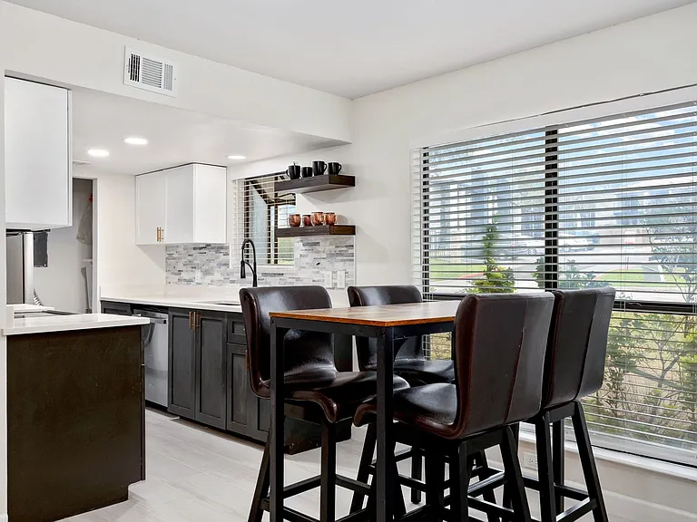 Dining space featuring sink
