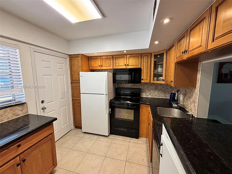 2810 NE 201st Ter #G108 — Photo 2