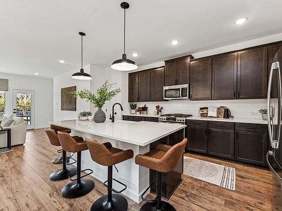 Kitchen with island and pendant lighting