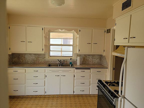 Kitchen cupboards and sink