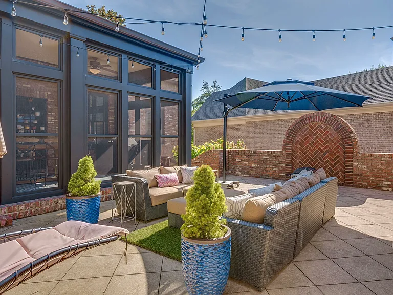 courtyard with access from 3 places inside the house. patio furniture and umbrella provided