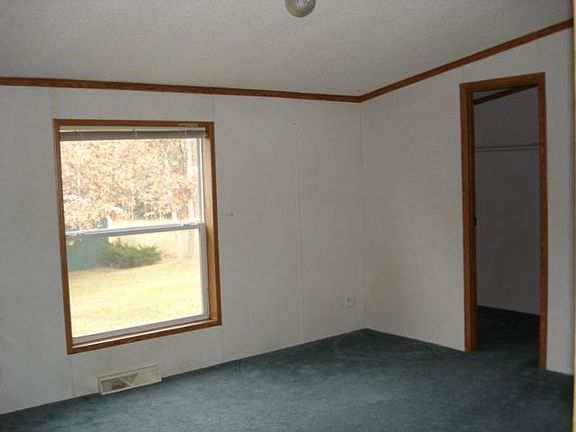 3rd image of 5496 E 12th St