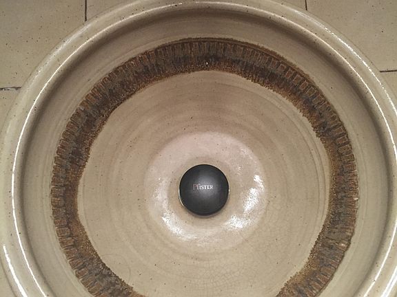 Handmade by local potter.