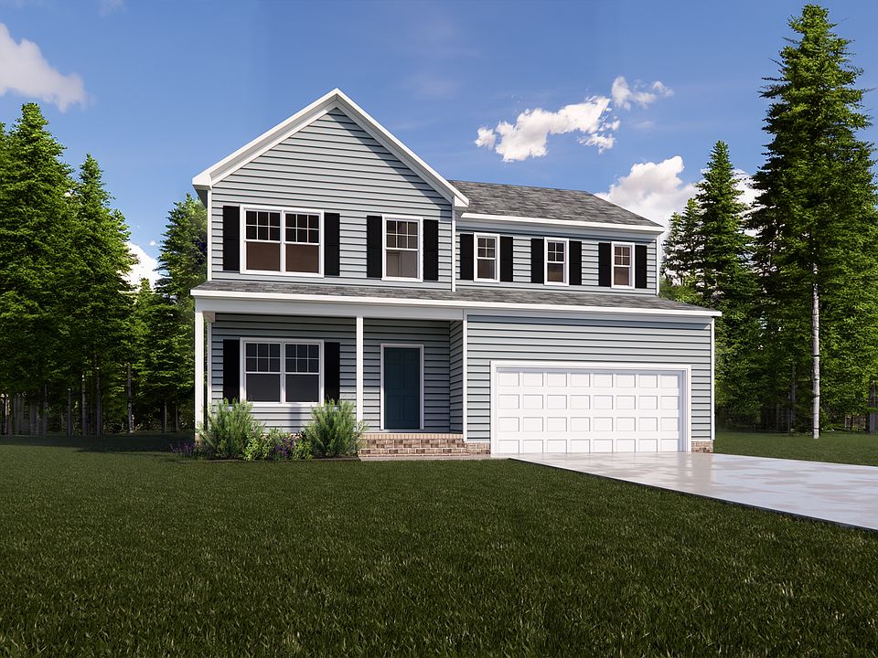Nestled in Poplar Village, this charming two-story house in Stafford boasts gray siding and a white