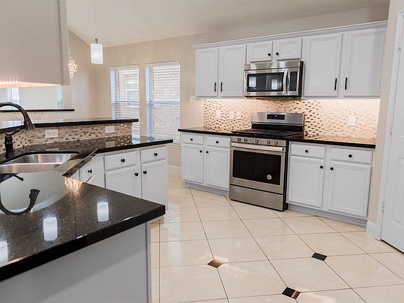 5th image of 9710 Woody Oaks Dr