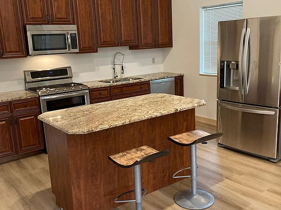 Kitchen and 6 foot bar/island