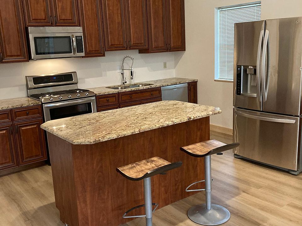 Kitchen and 6 foot bar/island