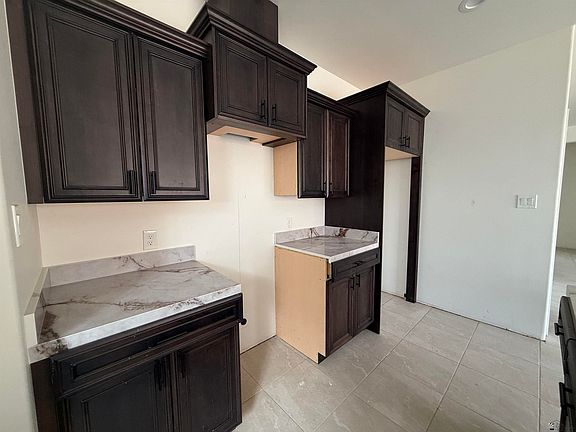4th image of 12585 E 51st Pl