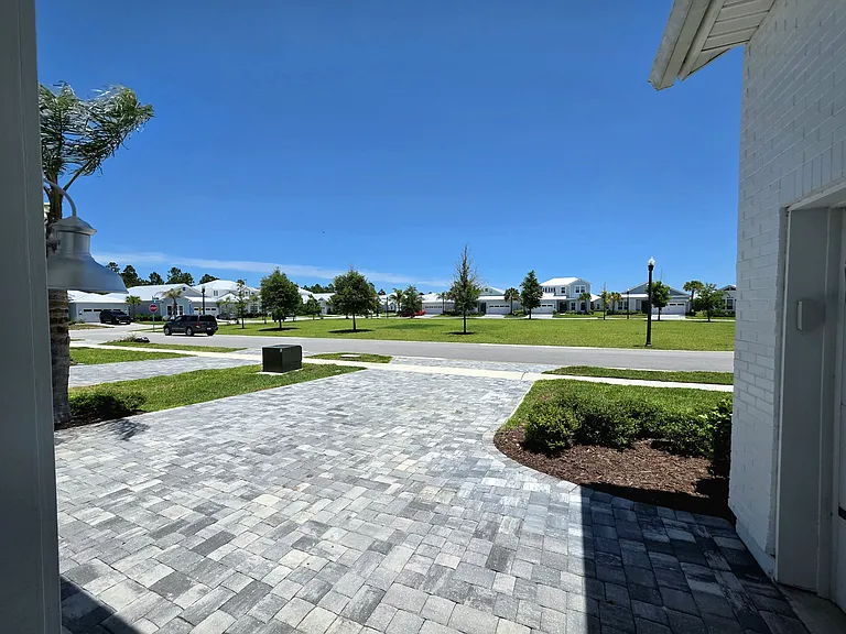 View from the front door: across from Dorado's park, offering extra privacy. Home located on street looped around the park, which gives a calmer street feel with minimal through-traffic.