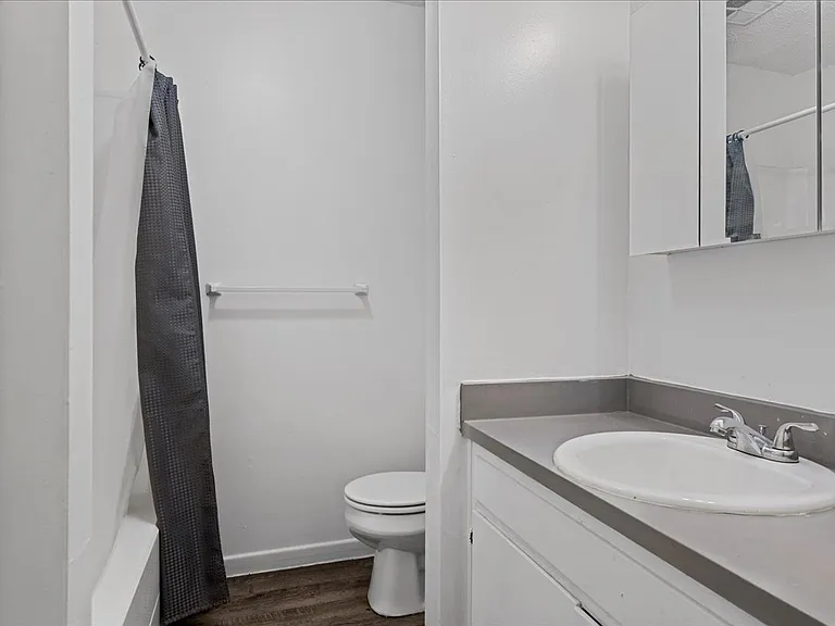 Village Apartments — Photo 16
