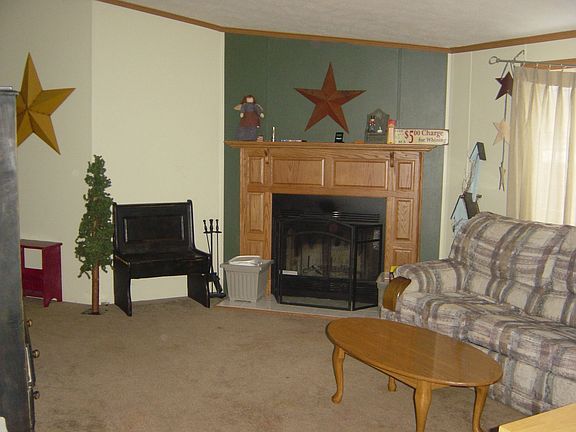Familyroom with wood burning fireplace