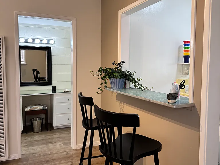 Breakfast bar with a view into the office/dressing area